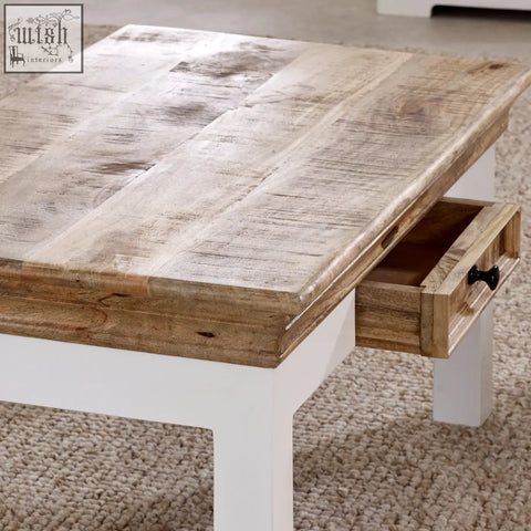Bianco solid mango wood coffee table with white painted base and single drawer with black knob for living room