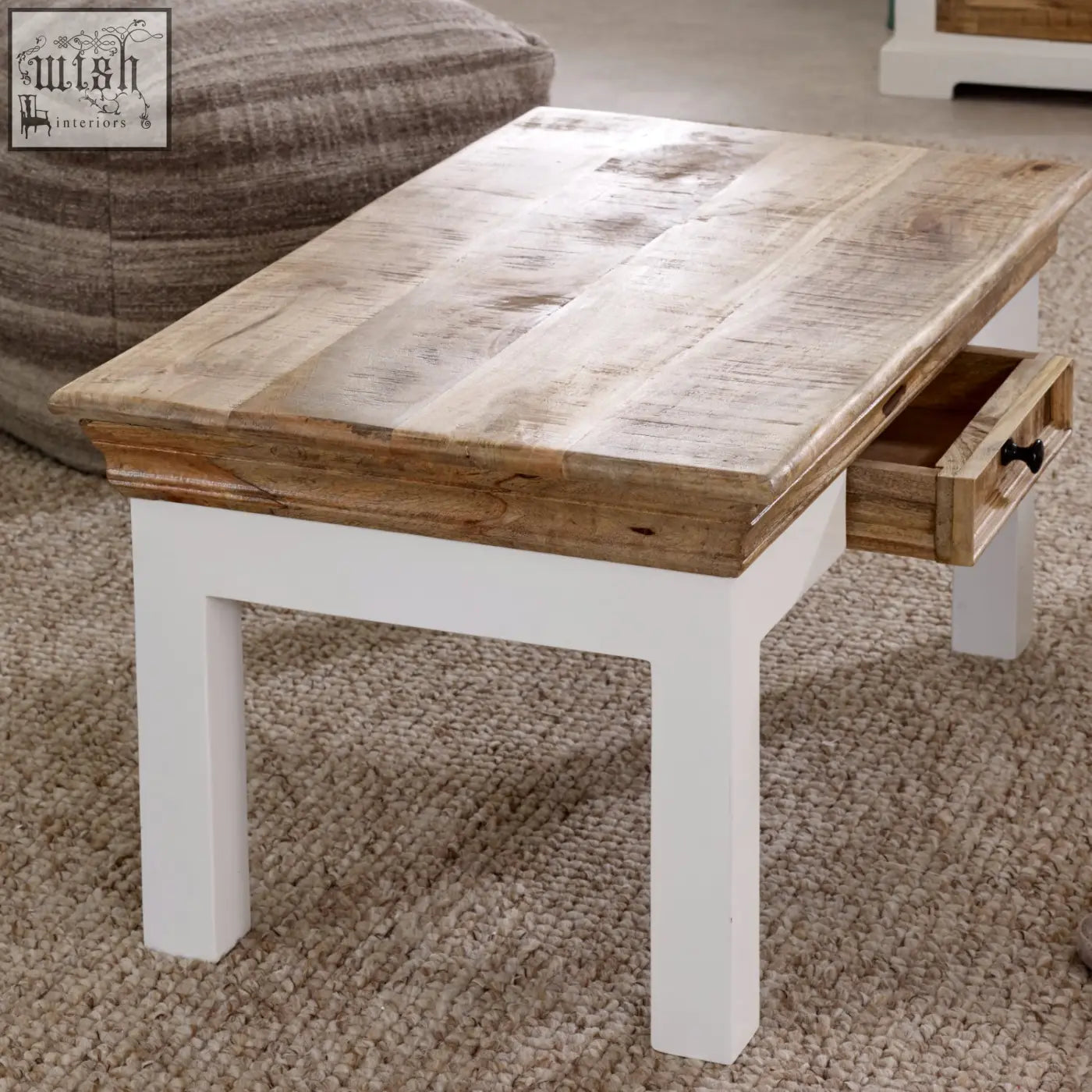 Rustic mango wood coffee table with white painted legs and small drawer perfect for living room use