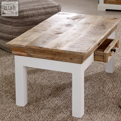 Rustic mango wood coffee table with white painted legs and small drawer perfect for living room use