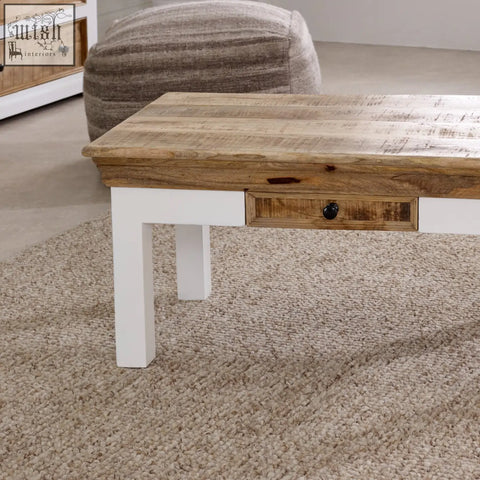 Rustic bianco solid mango wood coffee table with white painted legs and drawer perfect for living room use