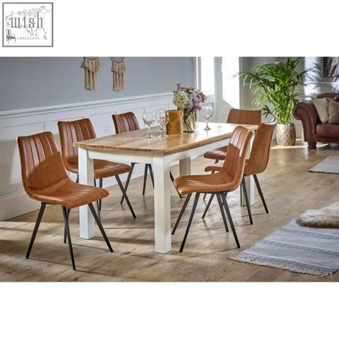Brown leather dining chairs with black metal legs paired with bianco solid mango wood white dining table 170cm