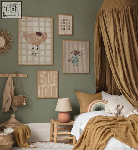 A cozy mustard-yellow canopy bed with soft fabric and plush pillow next to a big little feelings emotions art print on 250gsm paper