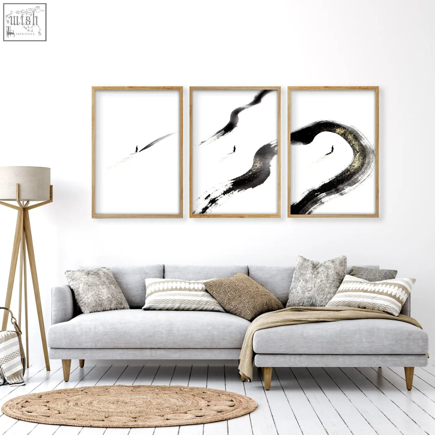 Set of three minimalist black and white brushstroke wall art pieces in light wood frames for living room wall decor