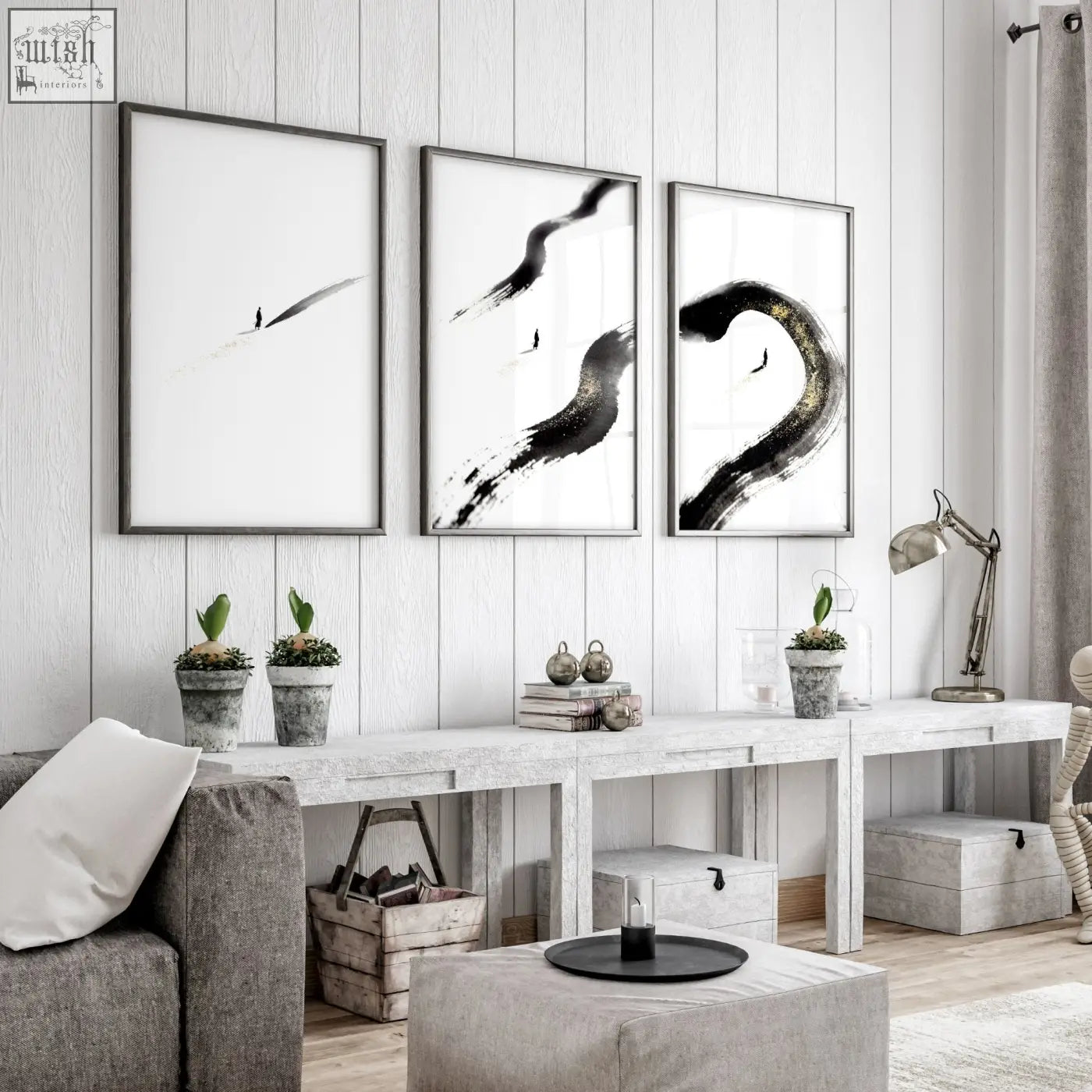 Three framed black and white ink brushstroke wall art with gold tones for big living room wall decoration in japandi style