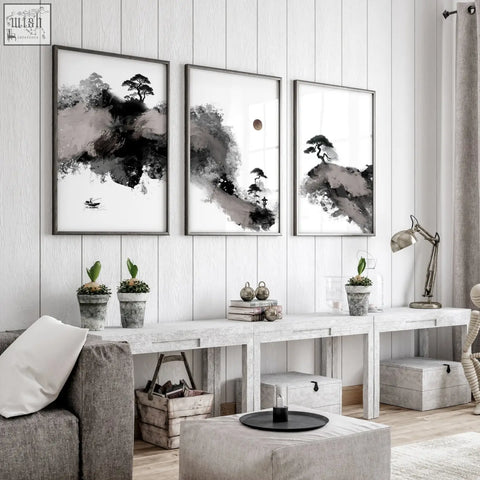 Three framed black and white japanese ink landscape art prints hang on a gray wall perfect as big painting for living room