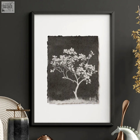 Black-framed living room wall art with delicate white tree silhouette on textured dark paper french country style