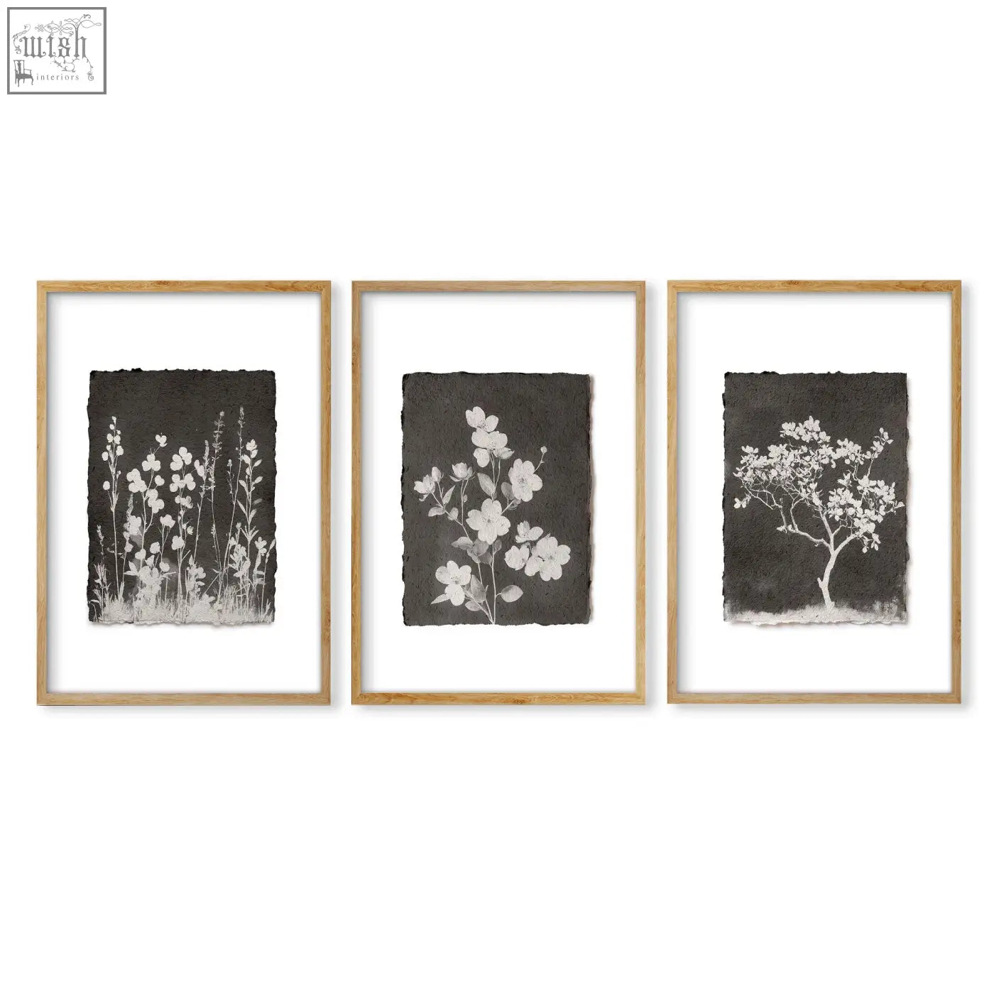 Set of three framed french country wall art prints with white floral silhouettes on dark paper for living room decor