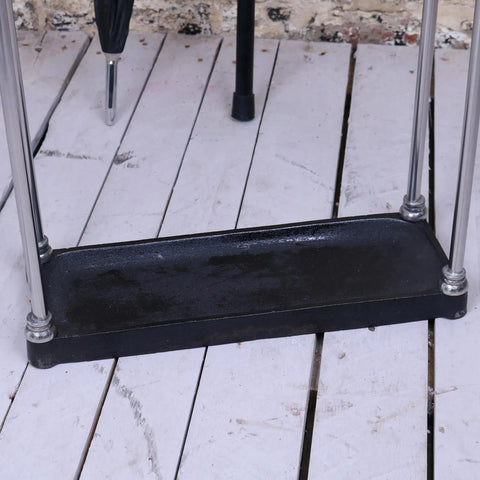 Black metal footrest with chrome legs and silver caps for bitlan rectangular walking stick stand or stick stand use
