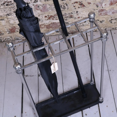Bitlan rectangular walking stick stand chrome metal with black base holding a single black walking stick umbrella