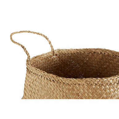 Natural medium seagrass basket in black and natural colors with two looped handles for easy carrying