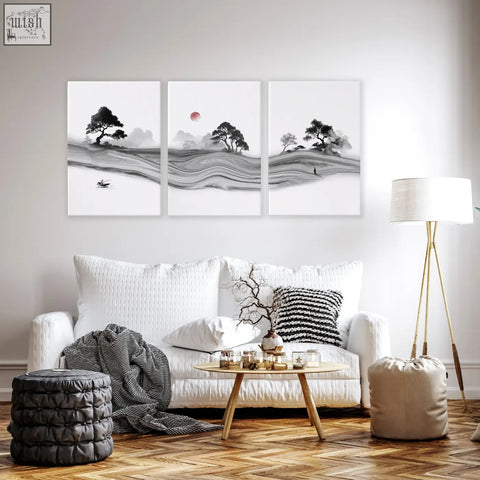 Three-panel black and white prints of japanese ink landscape with trees, misty hills, red moon, and boat for living room