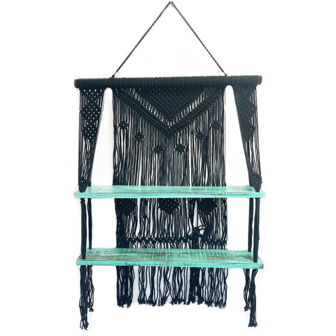 Black macrame hanging shelves with two turquoise wooden shelves for stylish wall storage and decor