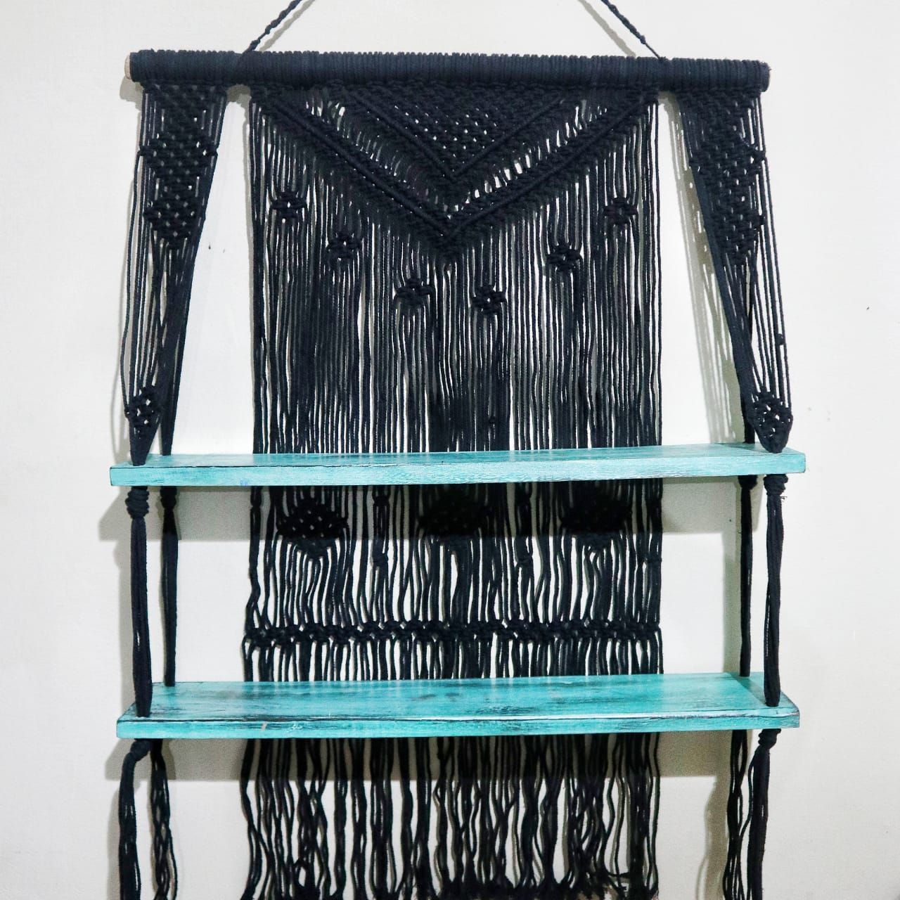 Black macrame hanging shelves with turquoise wooden shelves perfect gift idea for stylish wall decor