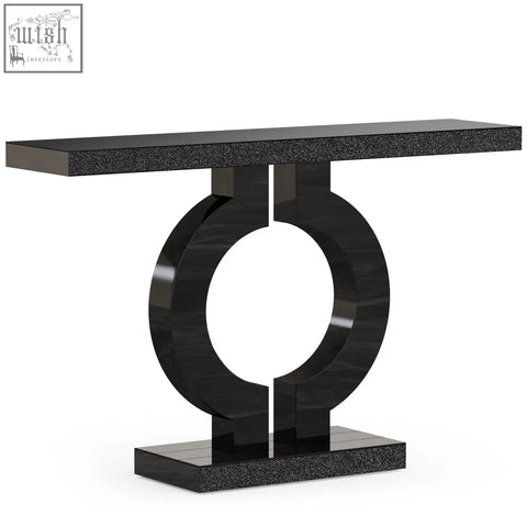 Black marble-effect modern console table with glossy speckled top and curved legs in an open circular design