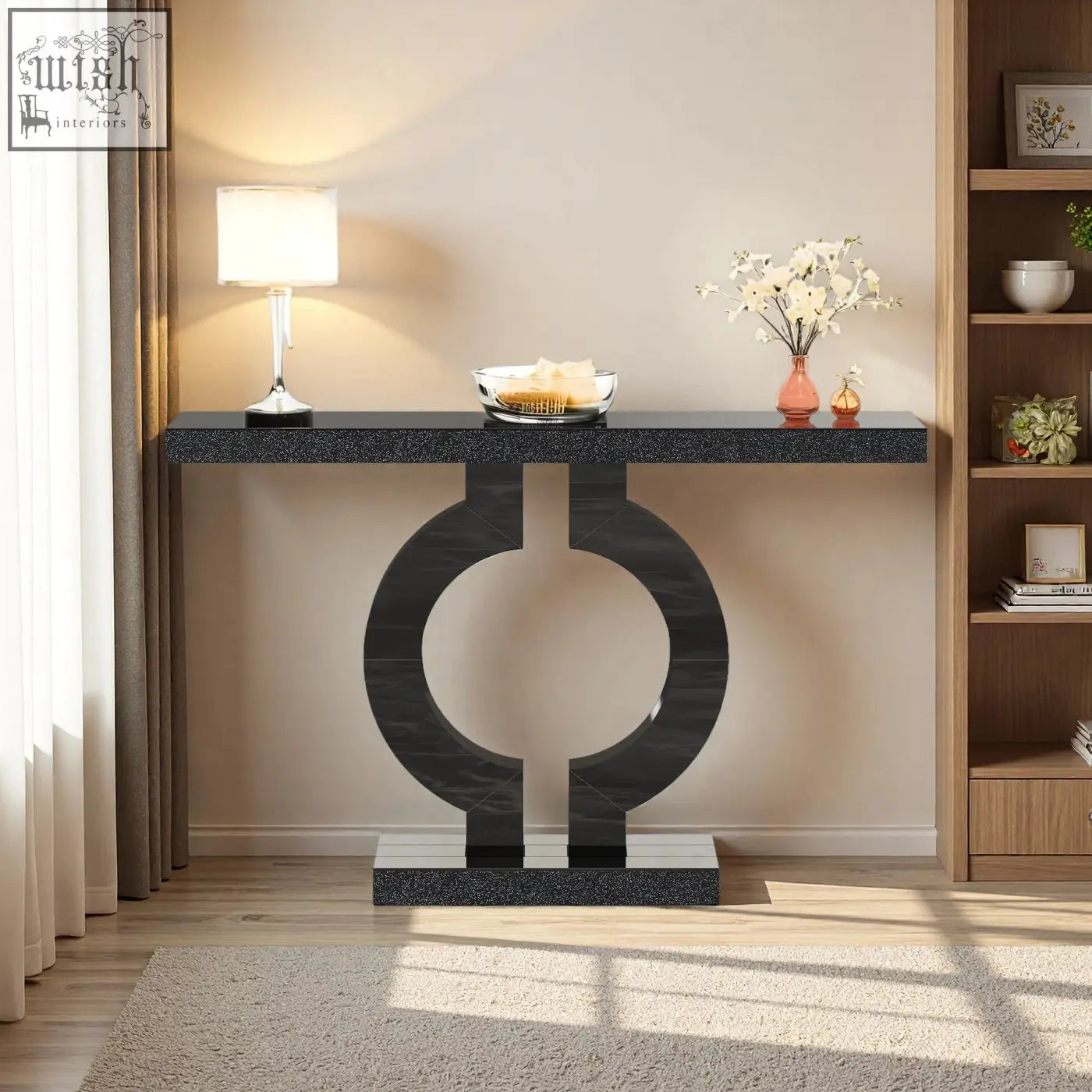 Black marble-effect modern console table with sleek circular base perfect as sculptural entryway or sofa table