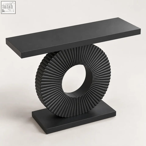 Black sculptural fluted console table with sleek rectangular top and circular fluted base for stylish entryway display
