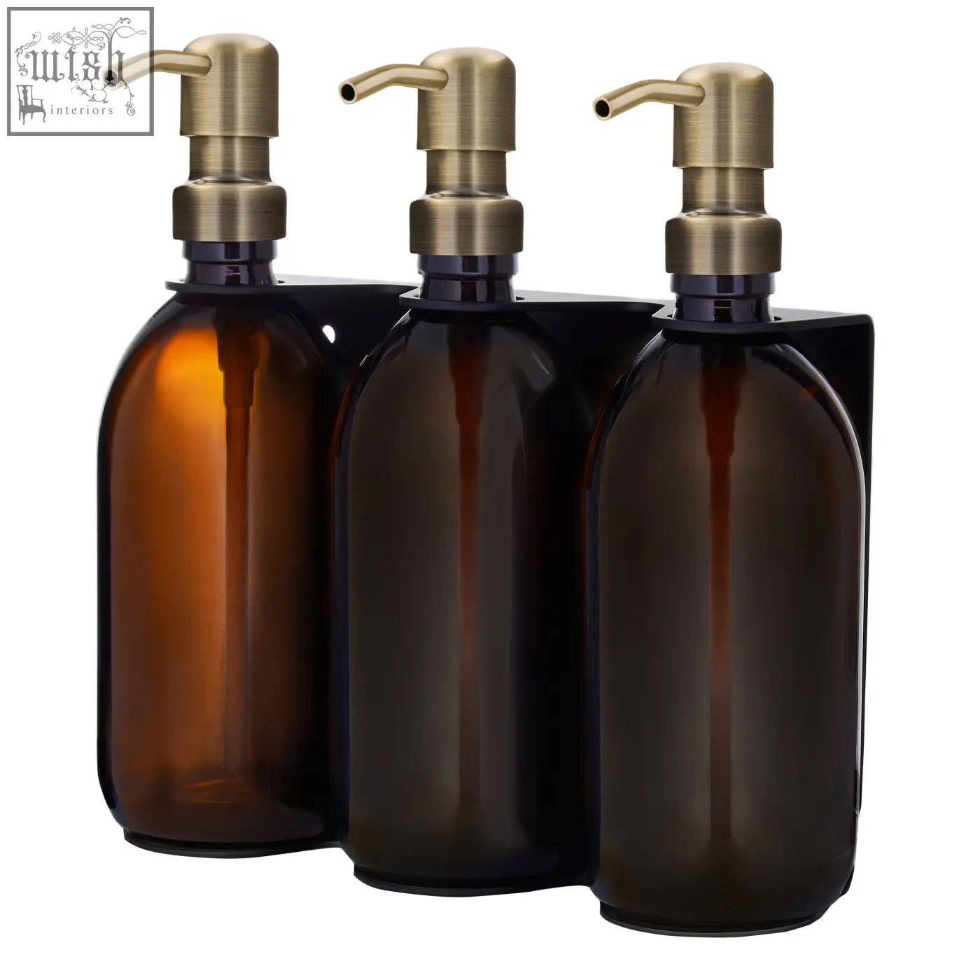 Black triple wall-mounted soap dispenser set with amber glass bottles and brushed brass pumps on a black bracket