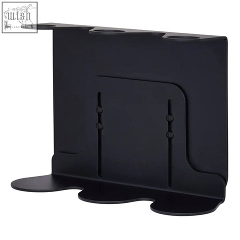 Black triple wall-mounted soap dispenser black metal stand with three circular cutouts and recessed back panel view