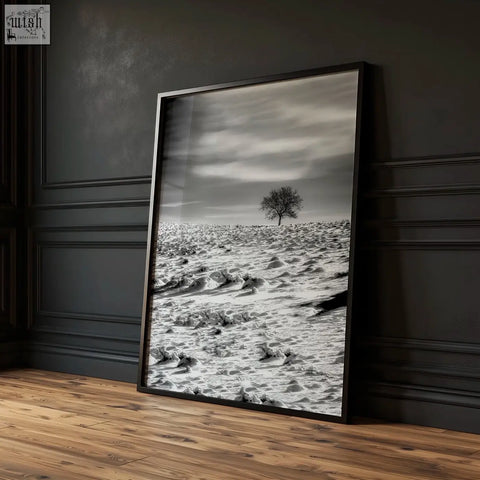 Black white photography print of a solitary tree in a snowy field part of winter nature landscape wall art set