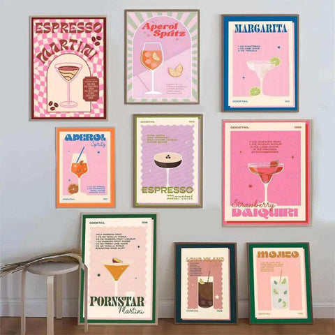 Set of seven framed bloody mary cocktail prints with retro illustrations in pastel pink purple and orange hues