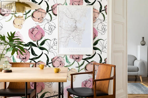 A framed map on delicate pink and green traditional paper peelable floral wallpaper for living space by clickwalls