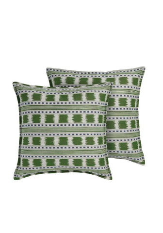 Green and white geometric patterned throw pillows featuring a blue and green stripe cushion cover design