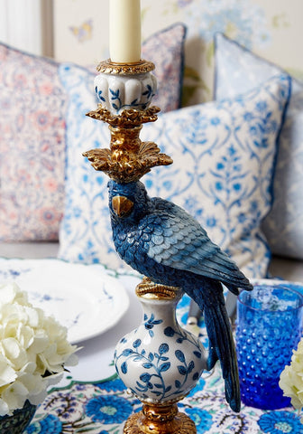 Blue ceramic parrot decorative tall candle holder with gold accents holding a white candle 40 cm right view