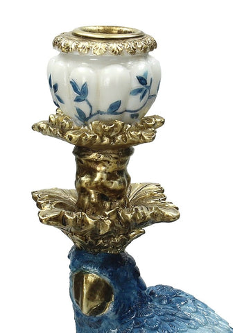 Blue parrot decorative tall candle holder with porcelain bowl and gold leaf details standing 40 cm tall on the right side