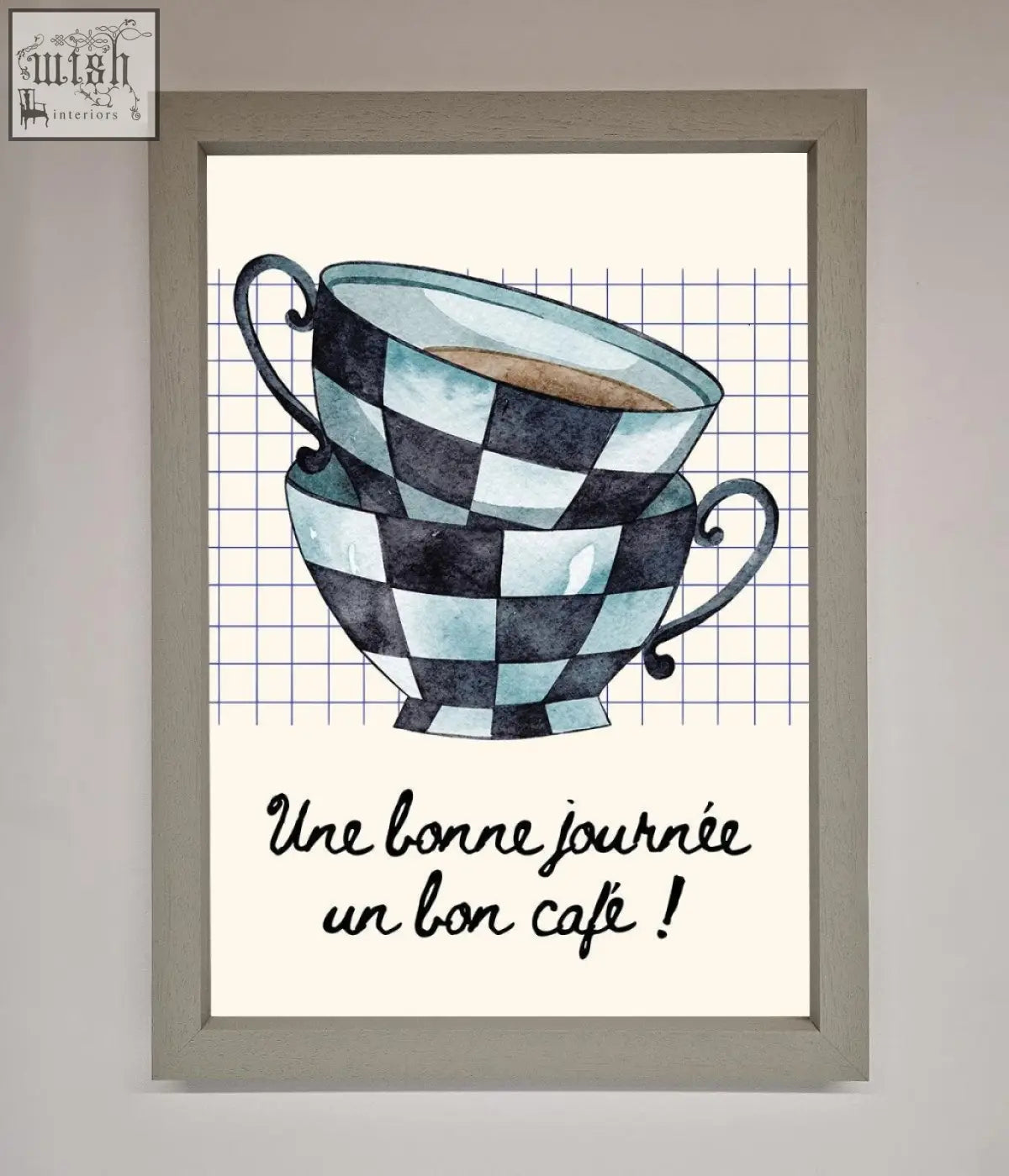 Watercolor illustration of a blue teacup stack with black and light blue checkerboard patterns in framed wall art