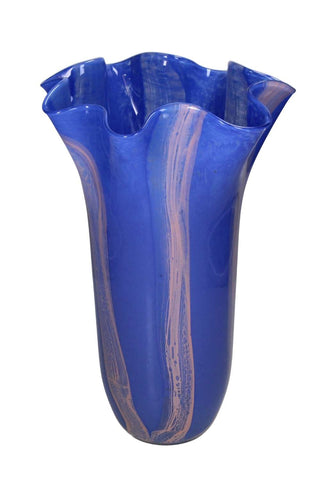 A vibrant cobalt blue glass vase with a fluted ruffled rim and pinkish purple streaks called blue twist glass vase with scallop