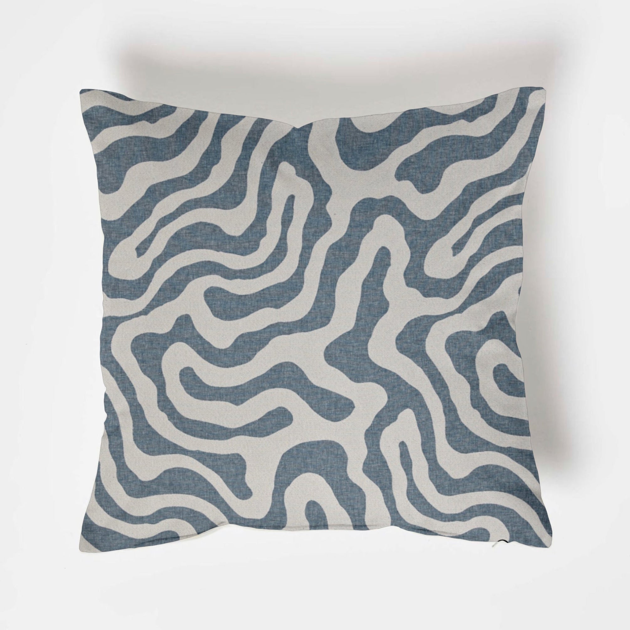 Square blue wiggle throw cushion with modern abstract white lines on a textured blue fabric scatter pillow