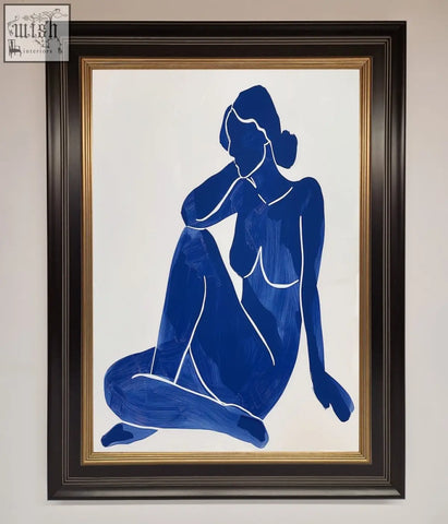 Framed print of blue woman pose matisse style silhouette painting in a dark brown frame with gold inner border