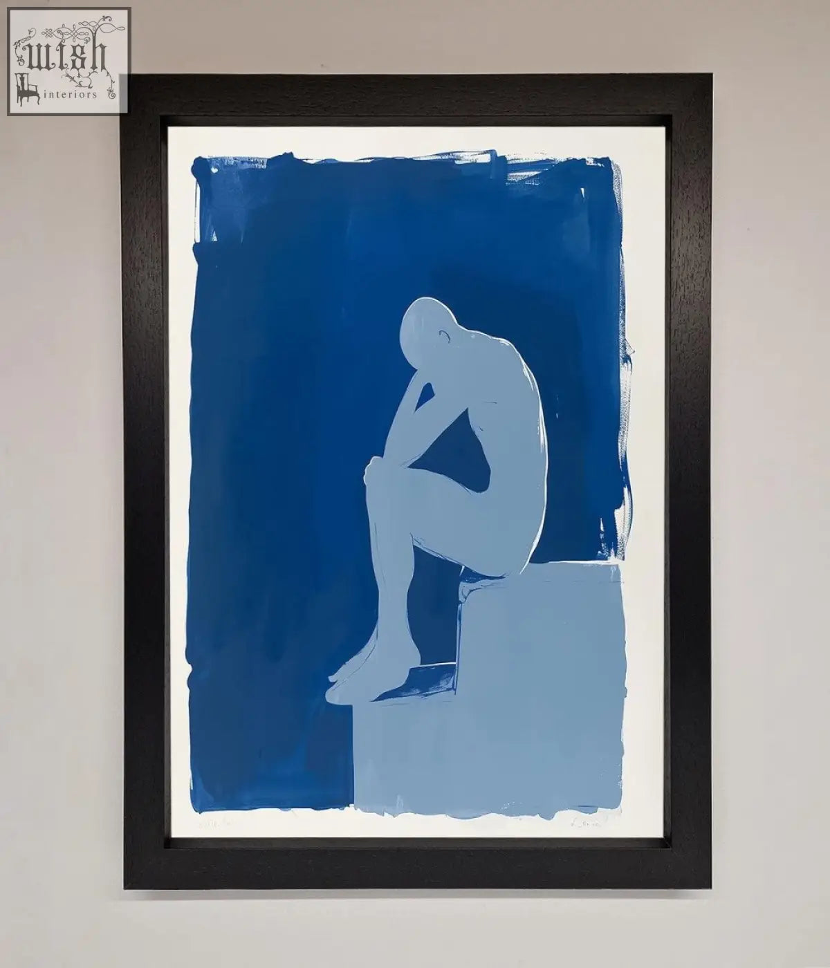 Blue abstract painting of a contemplative figure silhouette in black frame blues thinking framed print perfect for decor