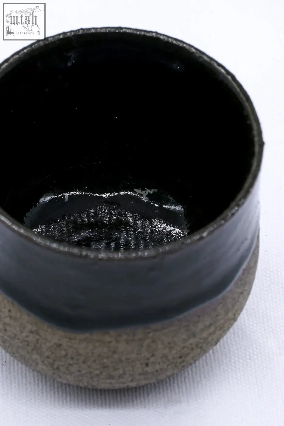 A bluverde tazza handmade ceramic smoked grey stoneware short cup with glossy black interior and textured earthy gray exterior