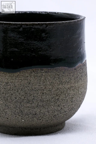 A bluverde tazza handmade ceramic cup with glossy black top and matte gray handmade ceramic smoked finish
