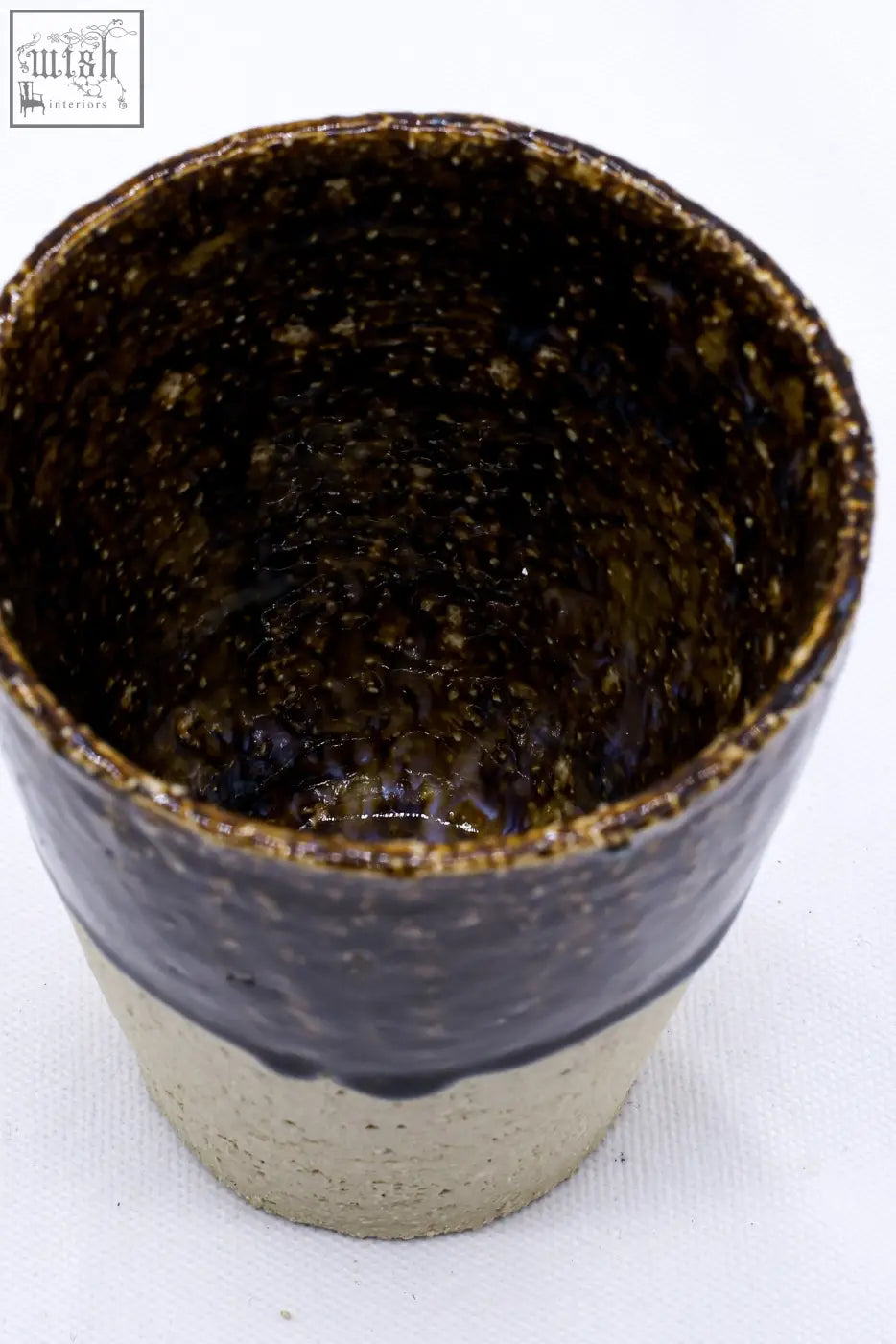 Handcrafted bluvio quadra milled stoneware tall ceramic cup with textured dark brown glaze and light beige base