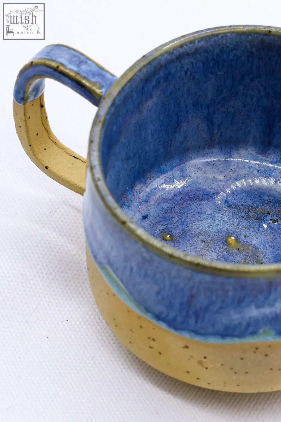 Handmade ceramic mug bluvio sienna handmade with vibrant blue glaze and speckled yellow base with matching handle