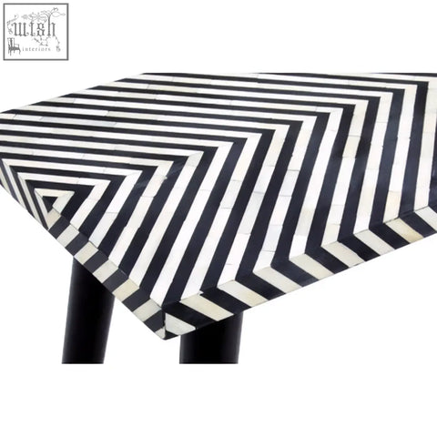 Boho black and white bone inlay console table with chevron pattern and sleek metal legs in modern design