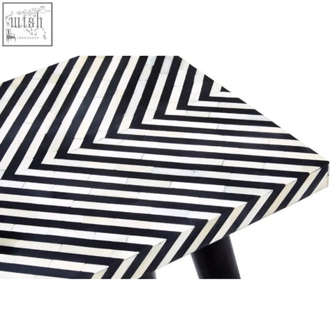 Boho black and white bone inlay console table with metal legs and a glossy chevron patterned tabletop