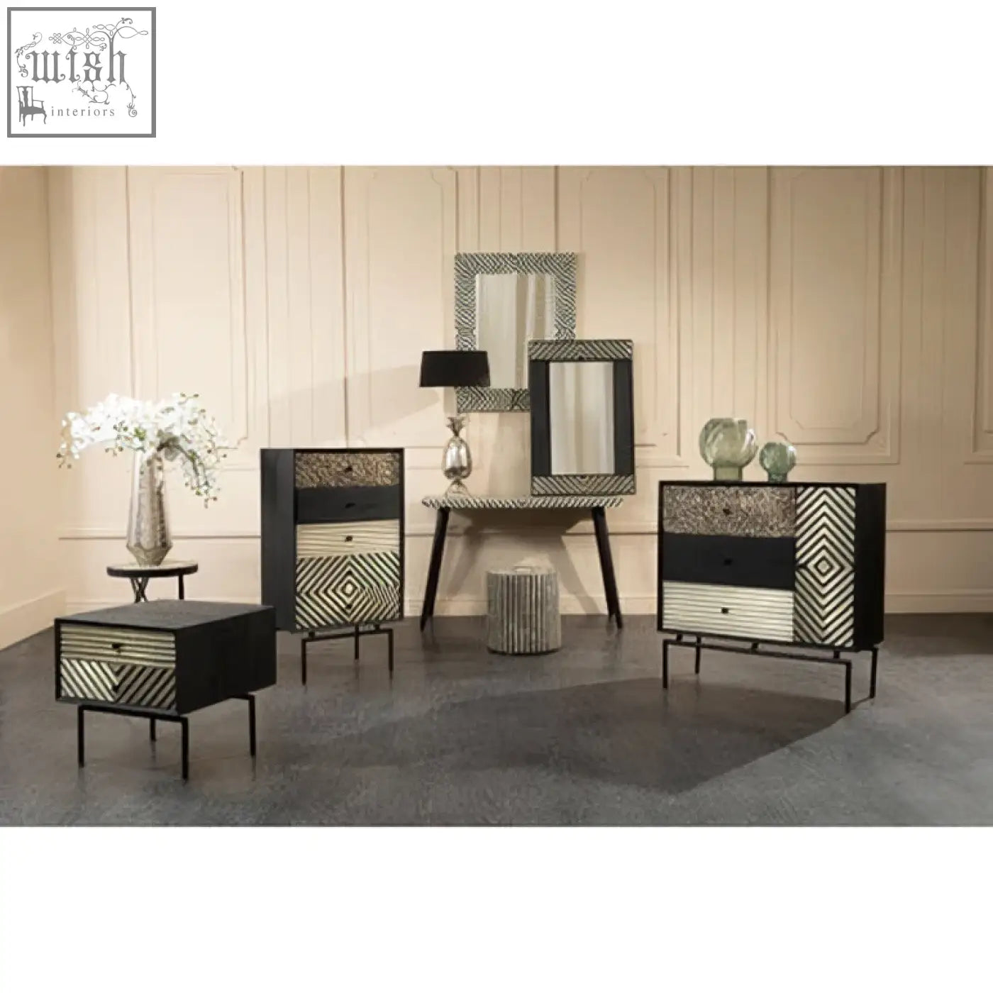 Boho black and white bone inlay console table with geometric pattern and metal legs in a modern minimalist style