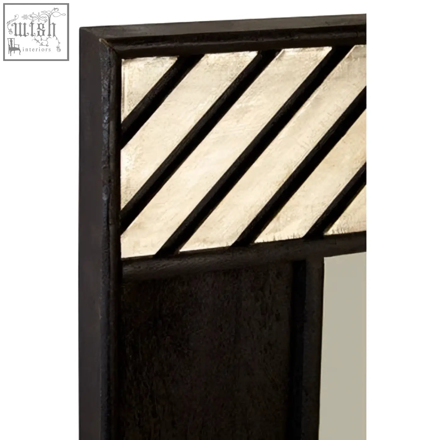 Boho black wall mirror with dark frame and diagonal textured metallic silver panels perfect for black wall decor