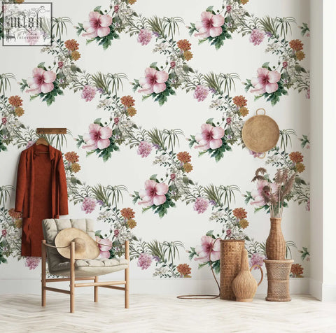Boho floral peel and stick wallpaper with pink hibiscus and green foliage perfect for refreshing your living space