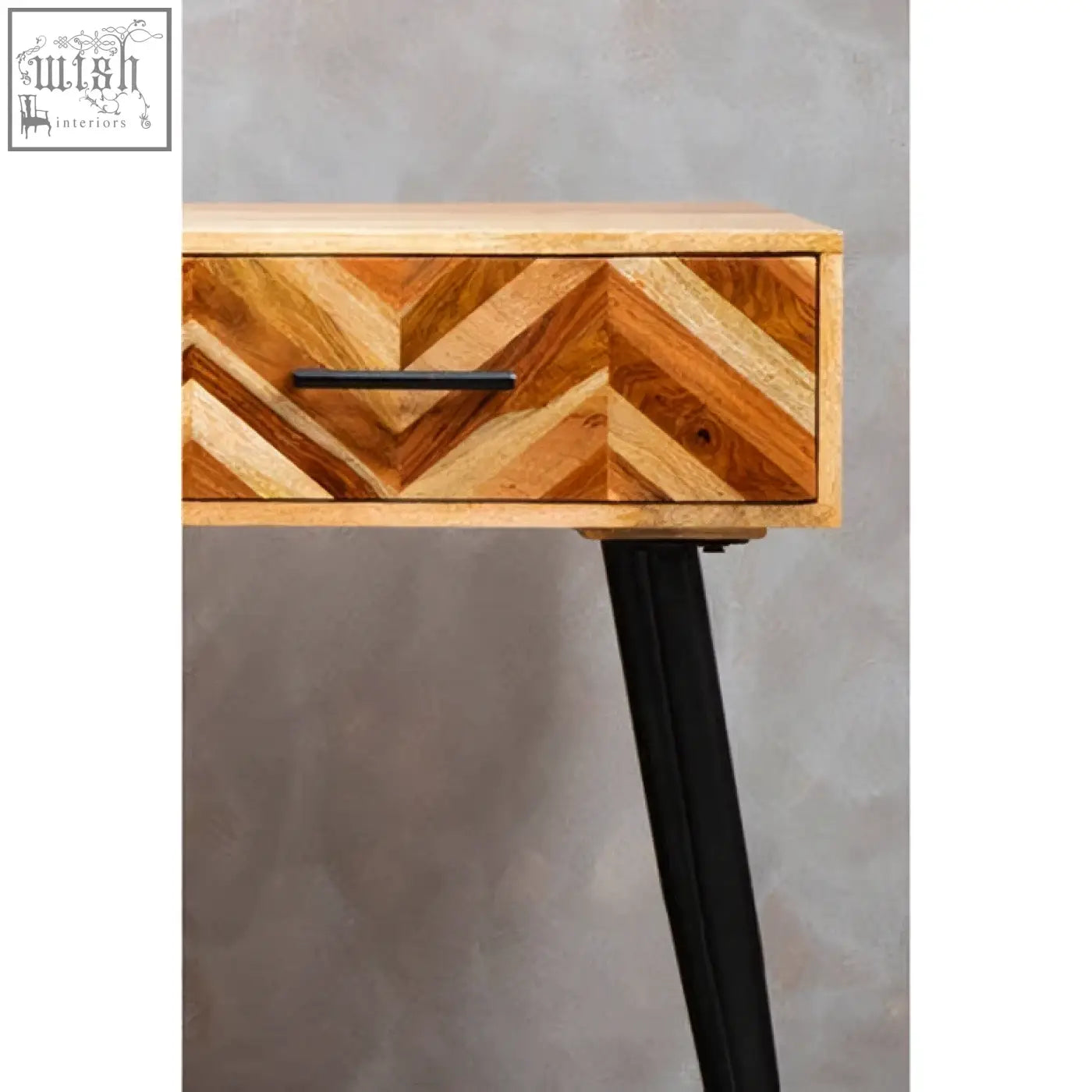 Boho two drawer mango wood console table with chevron patterned wood top and black metal legs in modern style