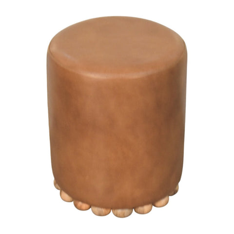 Tan leather bola leather stool with scalloped base made of light wooden spheres and cylindrical shape