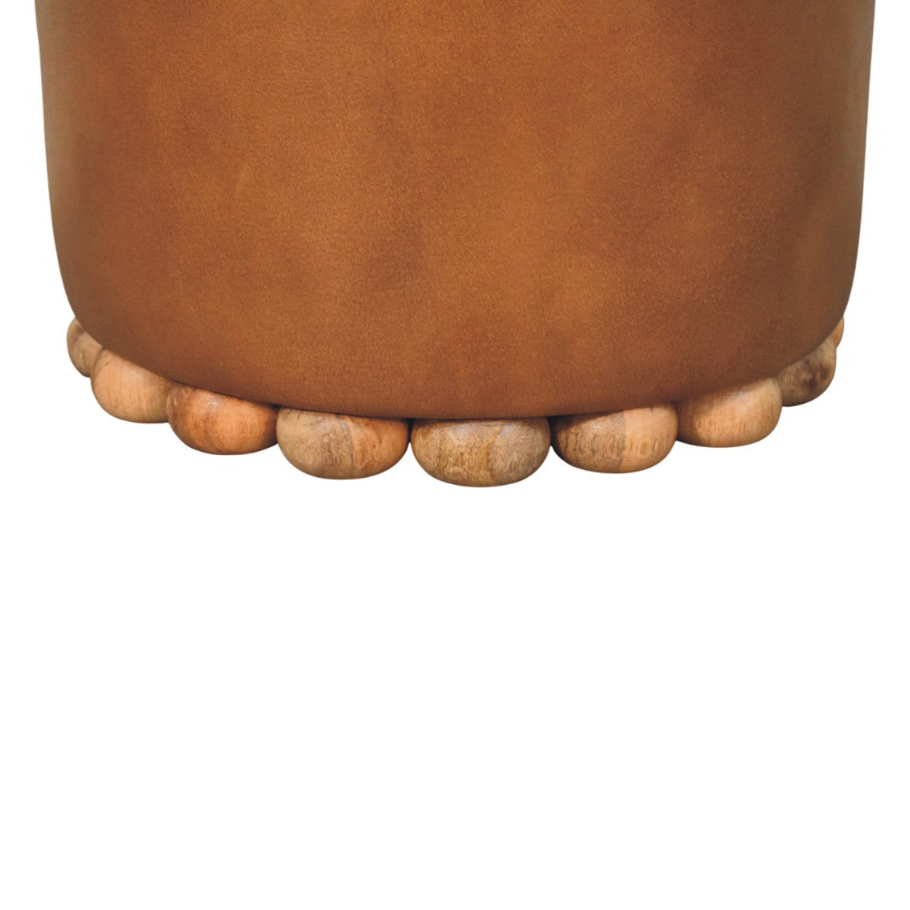 Tan leather bola leather stool with cylindrical shape and scalloped base of rounded wooden beads