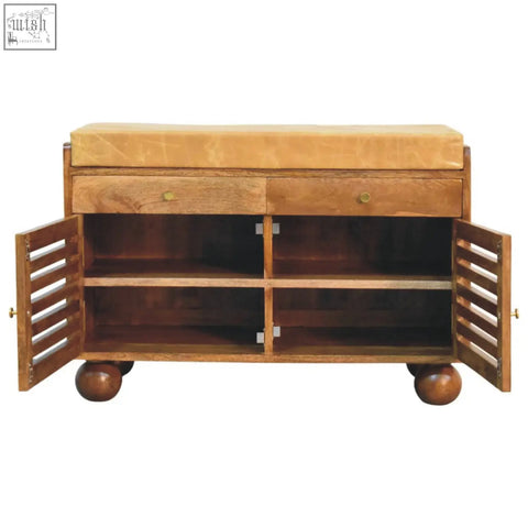 Wooden bola shoe storage bench with tan cushioned top two drawers and slatted side doors on ball feet