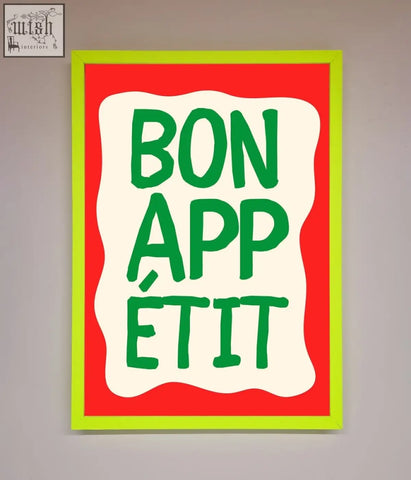 A bonappetit framed poster with bold green lettering on a white wavy background and a bright lime green frame