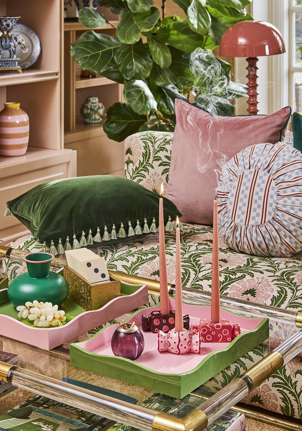 Pink and green painted wooden tray with scalloped edges holding candles decorative items and small vase bonbon tea light holder rose mix set of 3