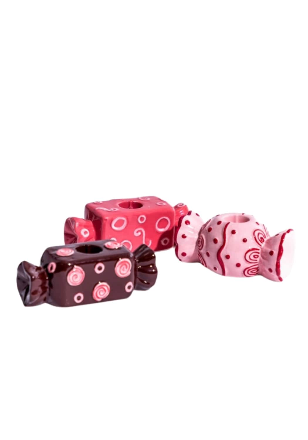 Three ceramic candy-themed bonbon tea light holders in glossy pink and dark brown with swirling patterns set of 3