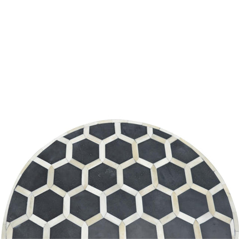 Black and white hexagonal bone inlay tabletop on an occasional stool perfect for extra seating or decor